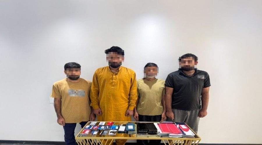 A photo of the four arrested, who allegedly ran forex scams (Photo: Dubai Police)