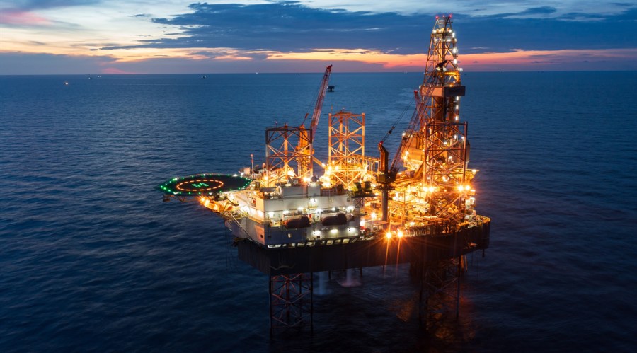 Aerial view from a drone of big jack up offshore drilling oil rig (shutterstock)
