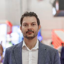 Aggelos Armenatzoglou, the Head of Dealing at Deriv