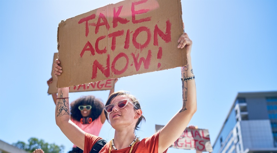 An activist with a signboard