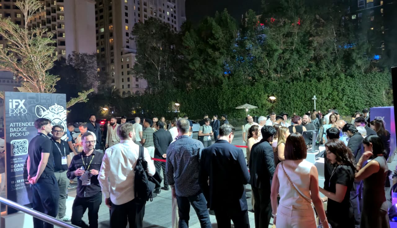 Crowd gathers at the iFX EXPO Dubai Welcome Party at Bla Bla Beach Club