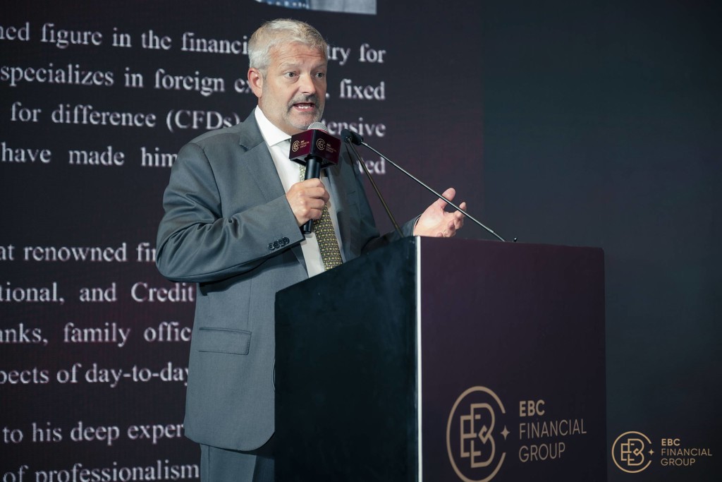 David Barrett, CEO of EBC Financial Group’s UK and Cayman entities, speaking at the event in Bangkok