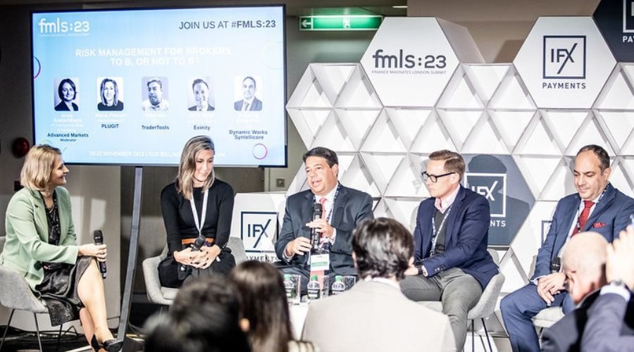 Drew Niv (in the middle) speaking in a panel discussion at FMLS:23