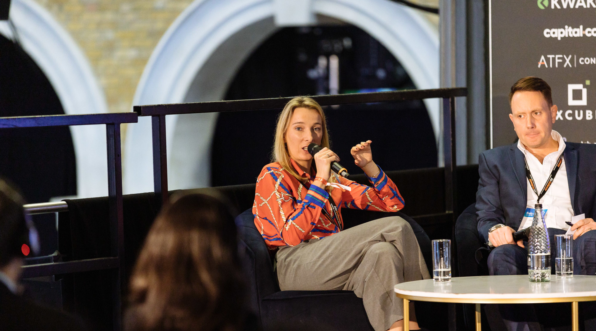 Elina Pedersen moderating at a Finance Magnates event