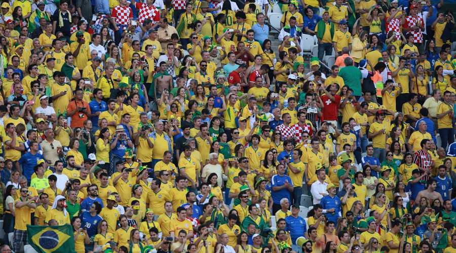 Football fans at the opening ceremony of the FIFA World Cup 2014 (Wikimedia)