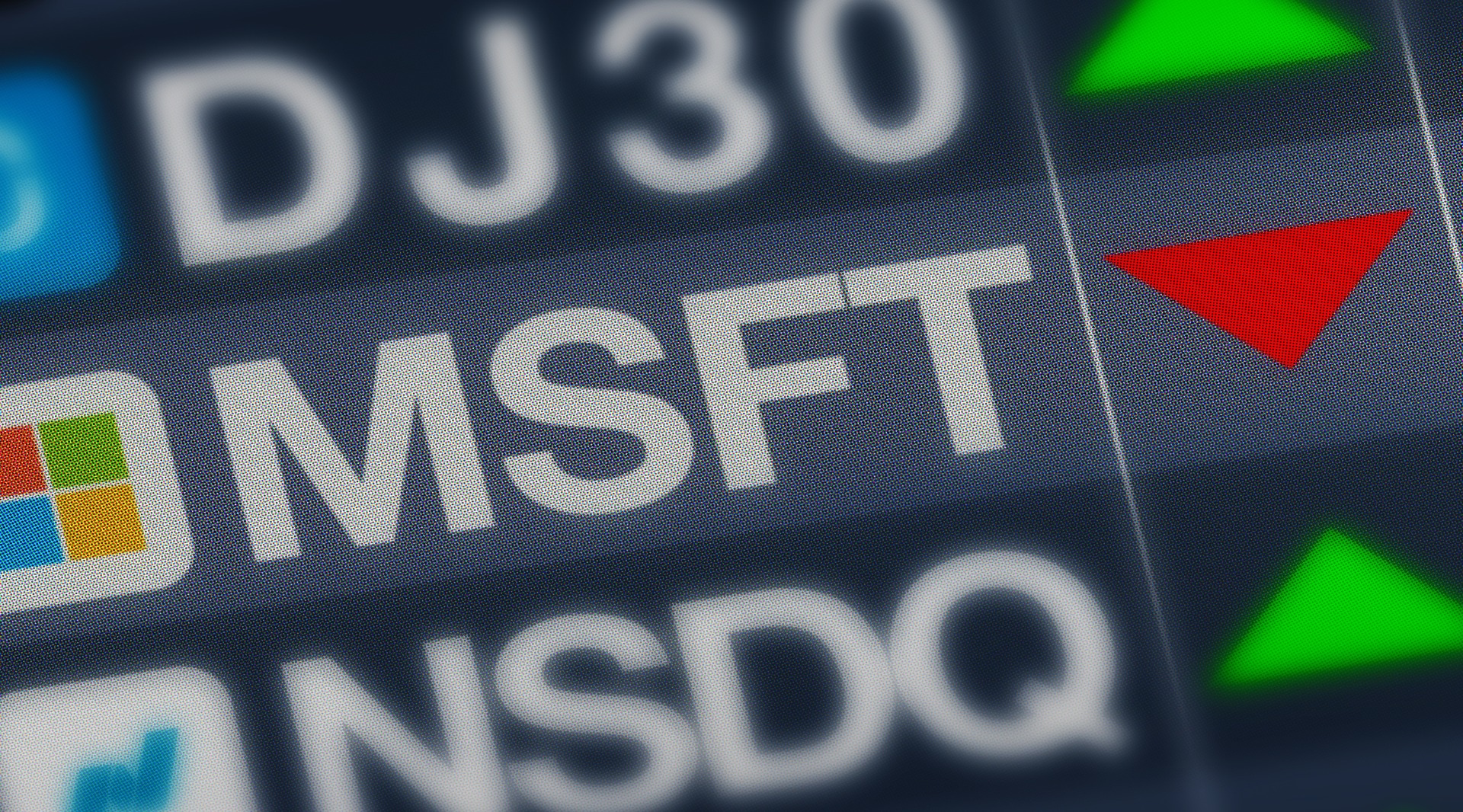 Microsoft ticker with a red down arrow in the middle of DJ30 and NSDQ