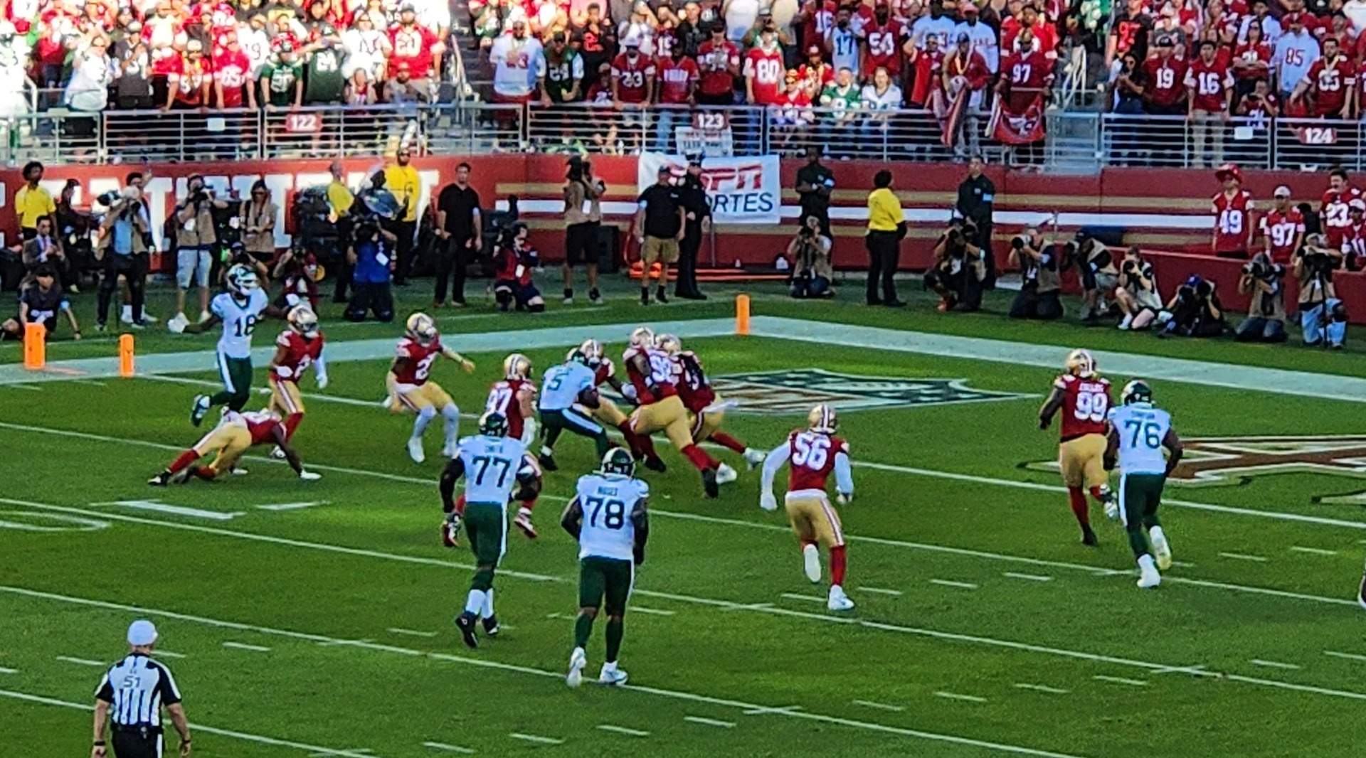 NFL game action, image source: Unsplash