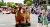 People dressed up in Yogi Bear and Boo boo bear costumes