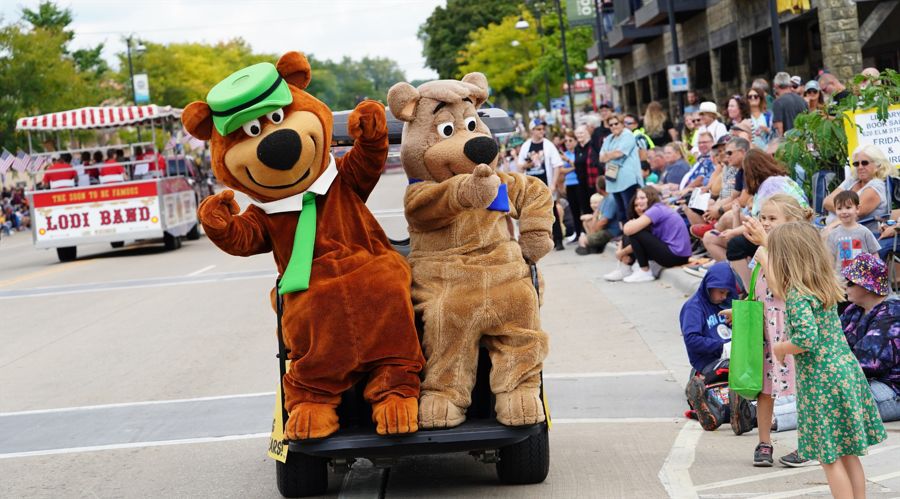 People dressed up in Yogi Bear and Boo boo bear costumes