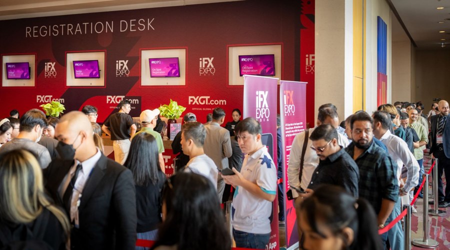 People waiting in line to enter the iFX EXPO Asia venue