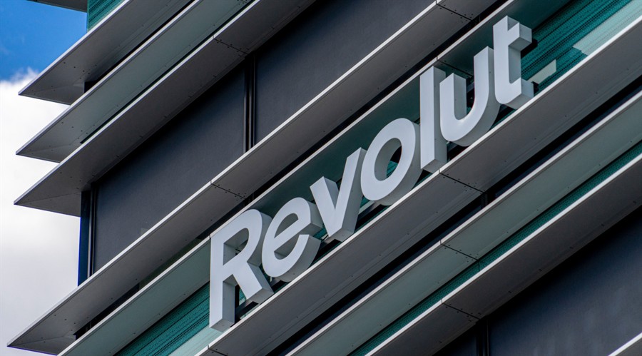 Revolut logo signboard on modern office building in Vilnius, Lithuania