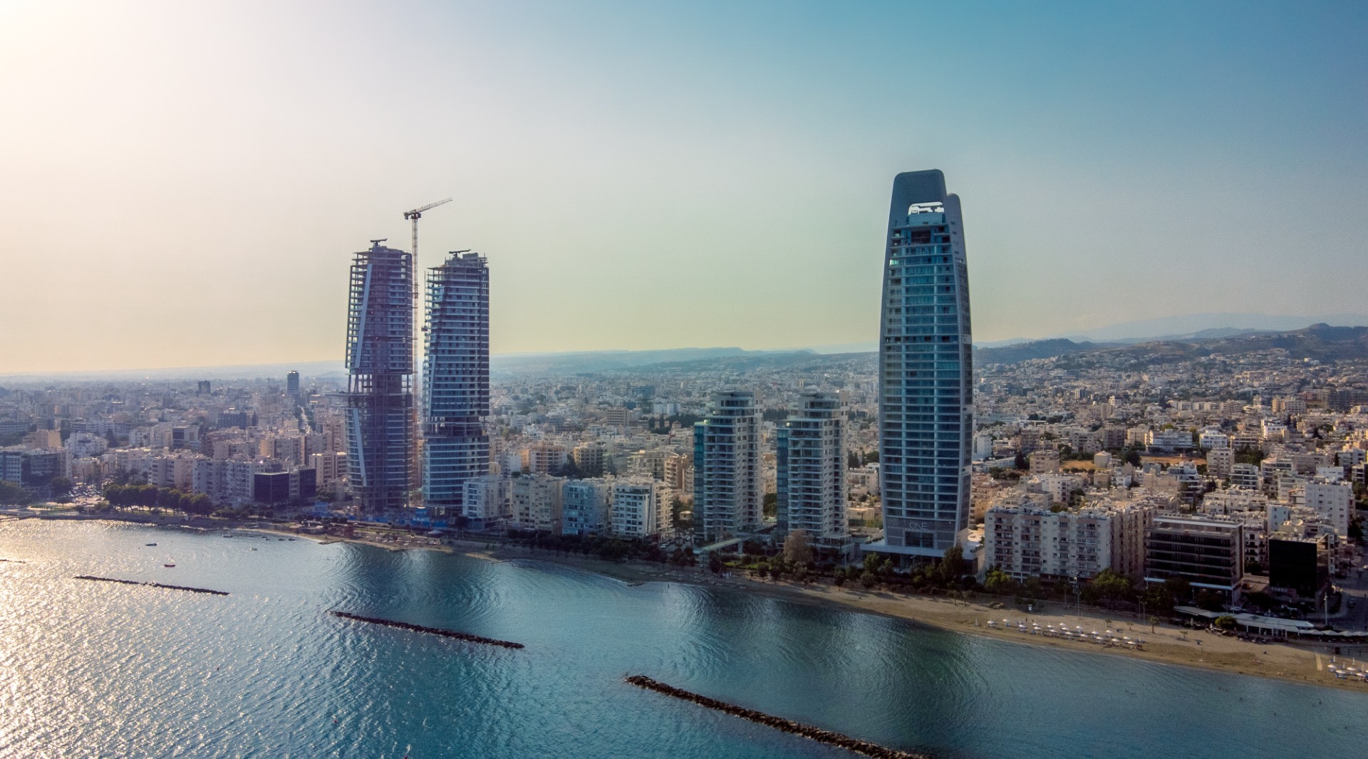 The high-rise buildings along the serene waterfront in Limassol. Cyprus