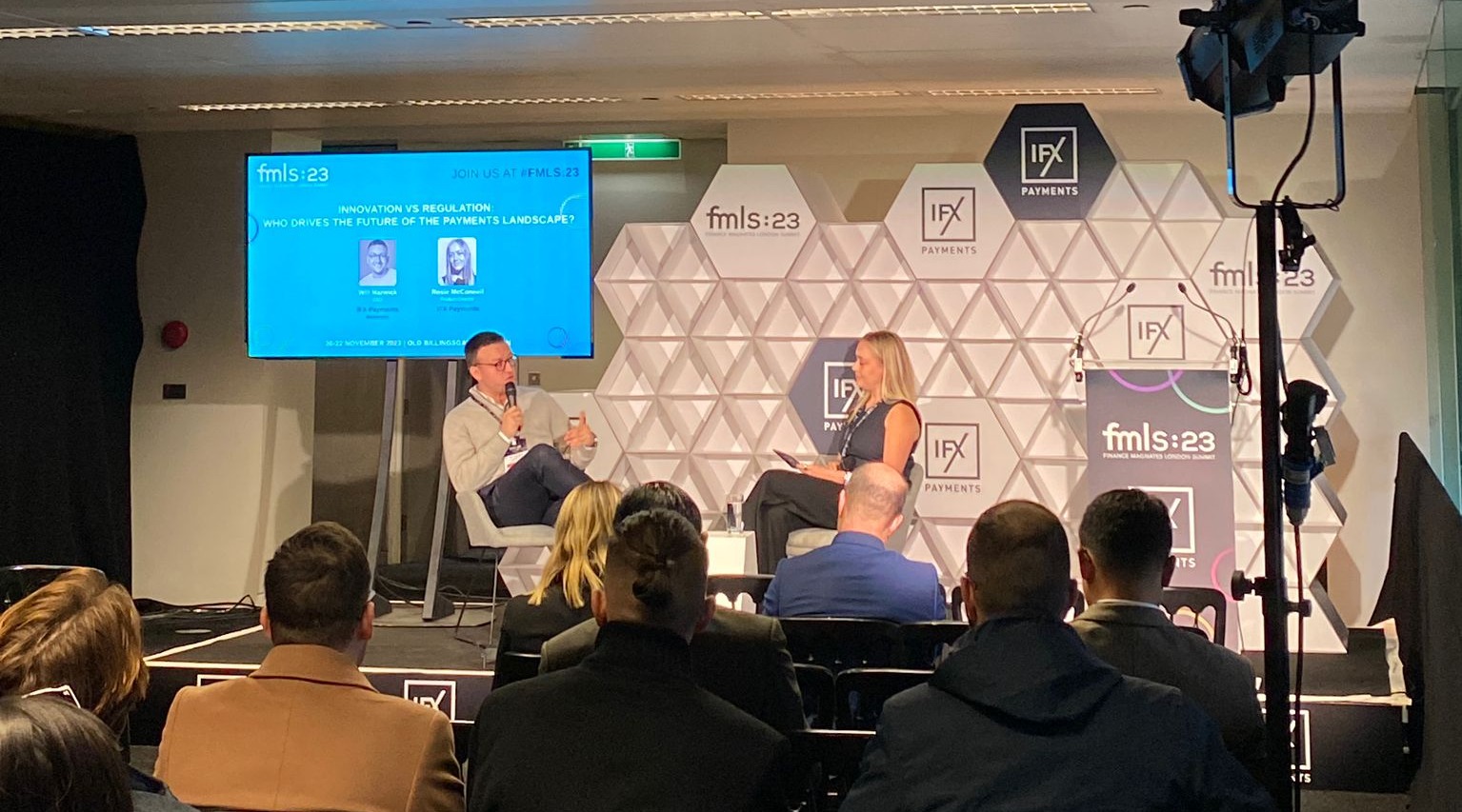 Will Marwick, CEO at IFX Payments, and Rosie McConnell, Product Director at IFX Payment, at stage