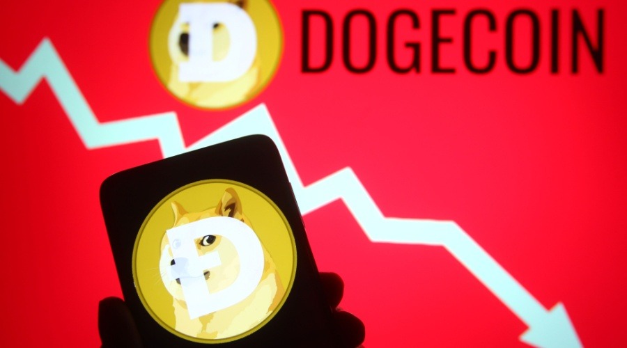 dogecoin token on a smartphone, with dogecoin logo and down arrow in the background